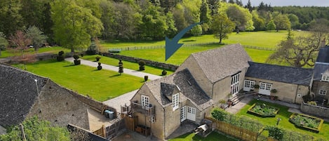 Aerial view of Newbarn Farm and Hayloft (with arrow), Bolthole Retreats