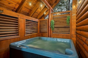 The private hot tub is tucked away and perfect for a relaxing evening 