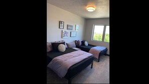 Bedroom with two queen beds.