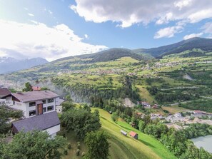 Cloud, Sky, Plant, Mountain, Ecoregion, Nature, Natural Landscape, Tree, Highland, Land Lot