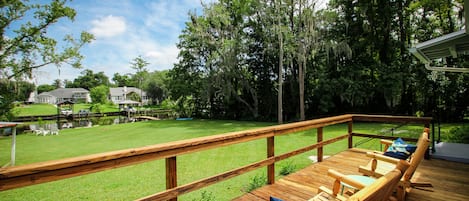 Large deck overlooking huge yard and waterfront
