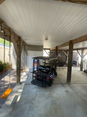 Under House Living Space - Golf Cart, Swings and seating for 13