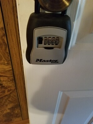 coded keypad with key inside.   
code changes after every rental 