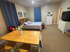 Private bedroom with queen size bed.