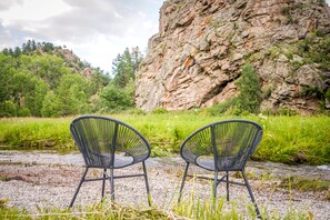 Chairs by stream