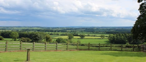 Enjoy breath-taking views from the patio and garden at Winsbury Cottage