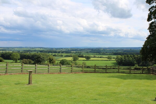 Enjoy breath-taking views from the patio and garden at Winsbury Cottage