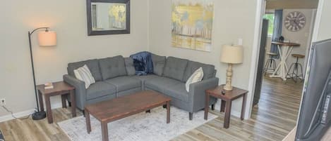 Cozy living area with sectional to relax in
