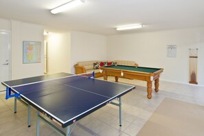Challenge friends to a tournament or simply unwind in the spacious games room, complete with table tennis, pool table, and a relaxed lounge zone for hours of fun.