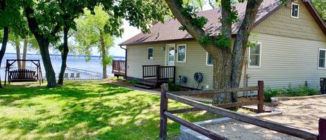 Enjoy the proximity to the water with a flat lawn in between