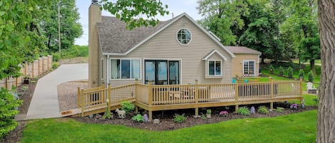 *The Waterfront deck off the back of the house features two patio tables.  Ramp access from the driveway makes the house wheelchair accessible.
