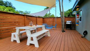 Private deck patio under shade with gas BBQ