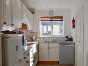 The well-equipped galley-style kitchen | Dartmoor View - Newbarn Farm, Collaton St Mary, near Paignton