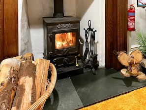 Characterful living room with wood burner | Hidden Cottage, near Coniston