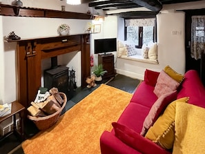 Characterful living room with wood burner | Hidden Cottage, near Coniston