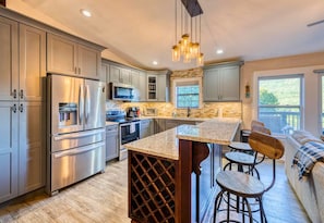 Stocked Kitchen with Stainless Steel Appliances and Ample Counter Space