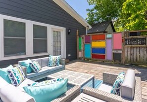 The deck is HUGE, colorful, and comfortable and ready to host your whole party.