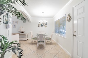 Enter into the clean, bright Foyer and Dining area and experience fresh Florida.