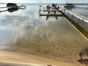 Sandy bottom goes a long way out for lots of swimming.