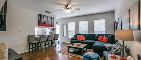 Spacious couch, with breakfast bar for great conversations.