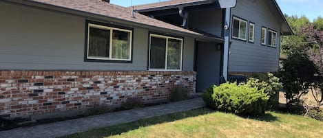 All new siding and windows and a fresh coat of paint makes the house stand out!