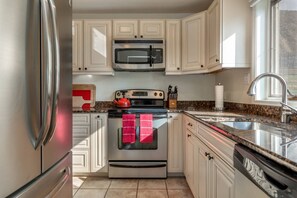 Fully Stocked Kitchen with Electric Range, Microwave, Dishwasher, Fridge with Ice Maker, Toaster Oven, Blender and Kuerig with Drip Coffee Maker