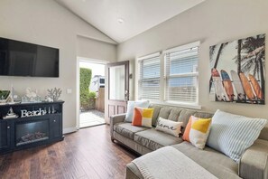 The living area with a large sofa.