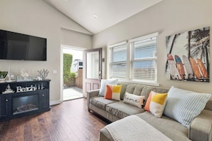 The living area with a large sofa.