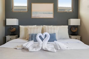 The king bed in the master bedroom (1).