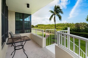 Lanai with stair acces to pool and beach boardwalk