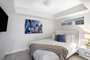 Interior 3rd bedroom, queen bed, Roku streaming Tv