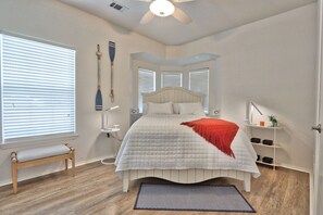 Mater bedroom with a queen bed