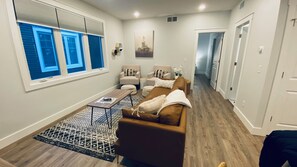 Living room with view to main bedroom 