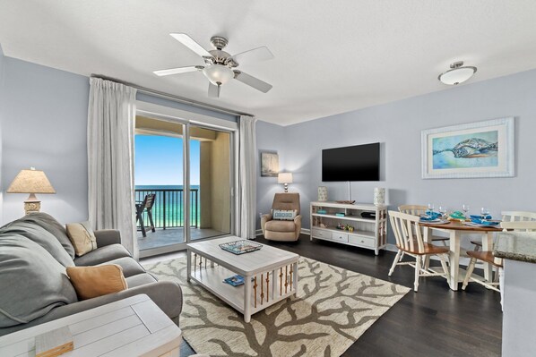 Spacious living room with Smart TV and costal style furniture 