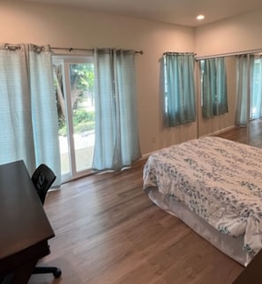 Master Bedroom with sliding door to private patio.