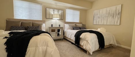 Bedroom 2 with 2 queen beds, luxury bedding