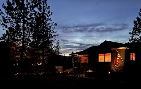 Front of cabin at dusk