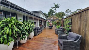 Fairy light deck overlooking the pool