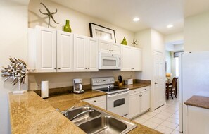 Fully Stocked Kitchen with all the Amenities! Perfect for Home Cooked Meals!
