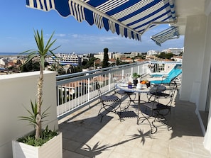 Large terrace with garden furniture