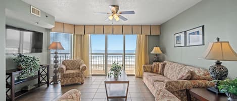 Relax in this comfy oceanfront living room and enjoy the fabulous views.