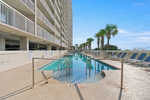 Catch some rays while the kids splash in the oceanfront pool.