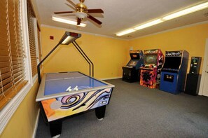 Take the kids to the on-site game room in the evenings.