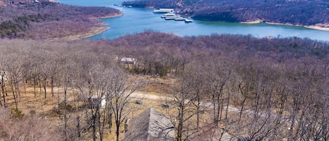 Drone view of house and lake