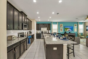 Additional sitting area across kitchen for large family. 