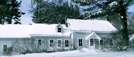 Front of Farmhouse on a snowy day.