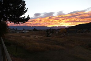 Sunrise over the Swan Mountain range.  Photo taken from deck.