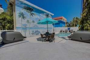 Hand painted mural on the side of the complex. Heated pool for your comfort and pleasure.
