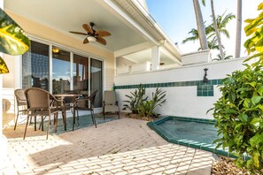 Savor your morning coffee and take in the picturesque views from your private patio, creating a tranquil start to your day at Key Lime Cottage.
