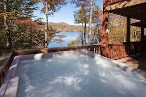 Soak in the hot tub as you gaze out over the lake!